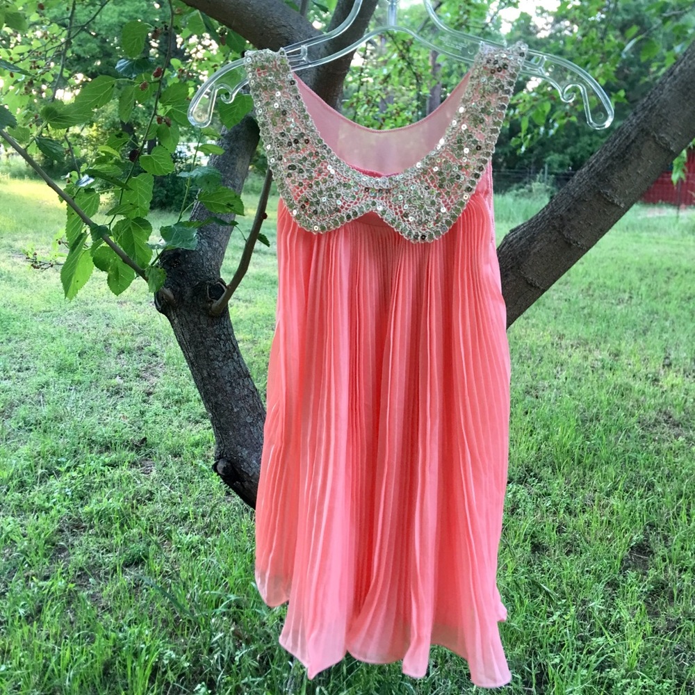 Pretty melon flowy dress with sparkle gold collar
